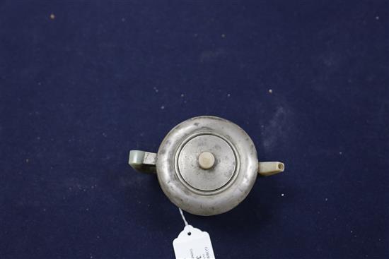 A Chinese pewter mounted Yixing teapot, Daoguang mark and of the period (1821-50), 14.2cm across